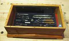 Showcase for antique drafting instruments