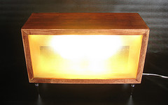 View of a double sided
accent lamp the lens of which are translucent green glass