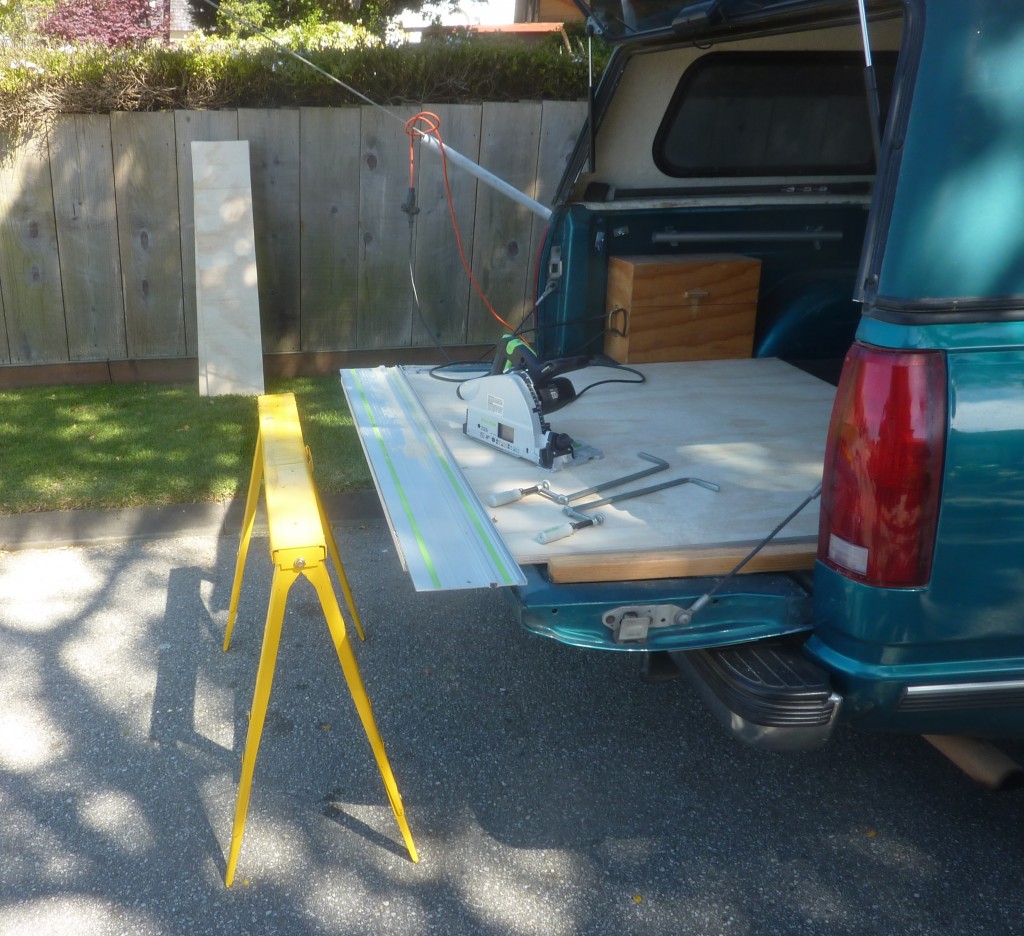 With adjustable sawhorses, the tailgate serves as an admirable platform for downsizing a full sheet of 3/4" ply.
