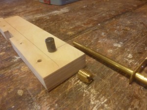The threaded insert, now out of favor is laughed at by the dowel insert standing atop the sled fence.  Ha!