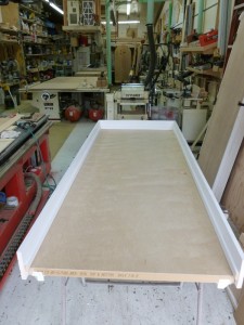 This is the solid (F'ing Heavy) door before the apprentice applies the pre-made frames.