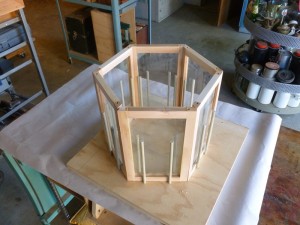 Panes shown in the holding jig which will allow your artisan to remove them one by one for painting.