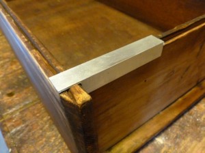 Aluminum patch in place on drawer