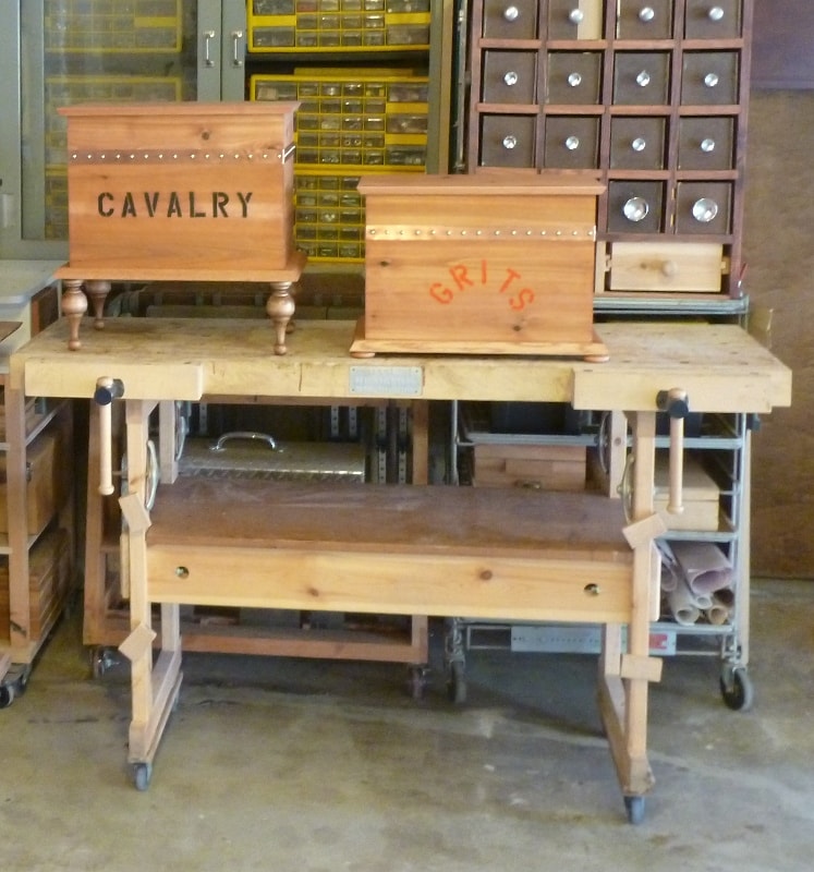 Cavalry and Grits cedar boxes on the workbench in The Workshop
